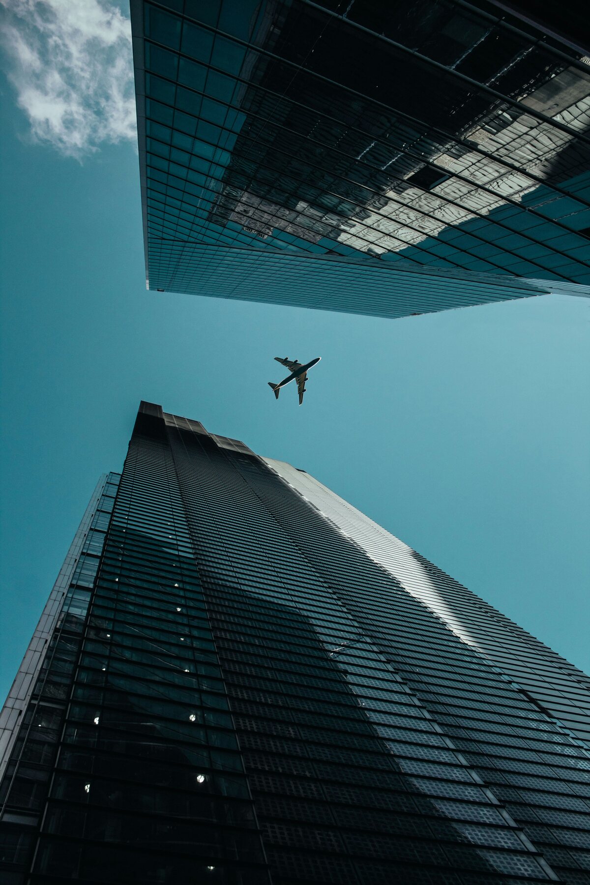 Aircraft flying between high-rise buildings
